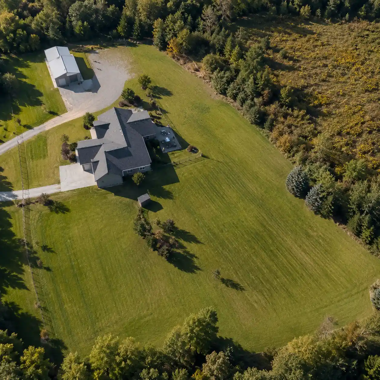 Aerial view of a residential septic drain field in the mountains near Asheville, NC